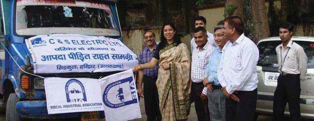 Flagging off C&S sponsored truck carrying relief material for calamity