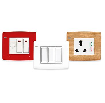 Red, white and wooden finish switches and sockets