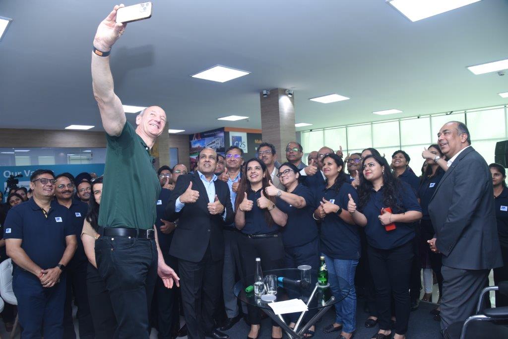 Dr. Roland Busch, President and CEO of Siemens AG, and Mr. Sunil Mathur ...